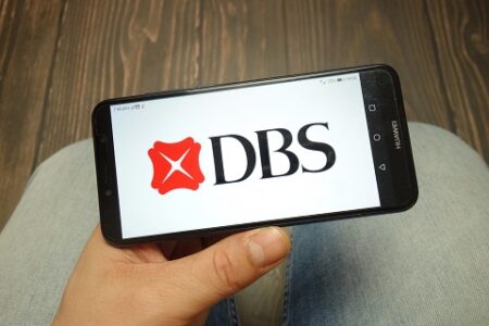 DBS logo showing on a smartphone screen - IMD Business School