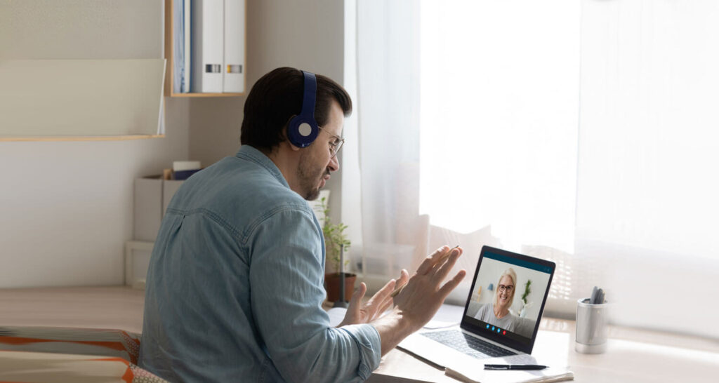 An online program participant having a coaching session via video